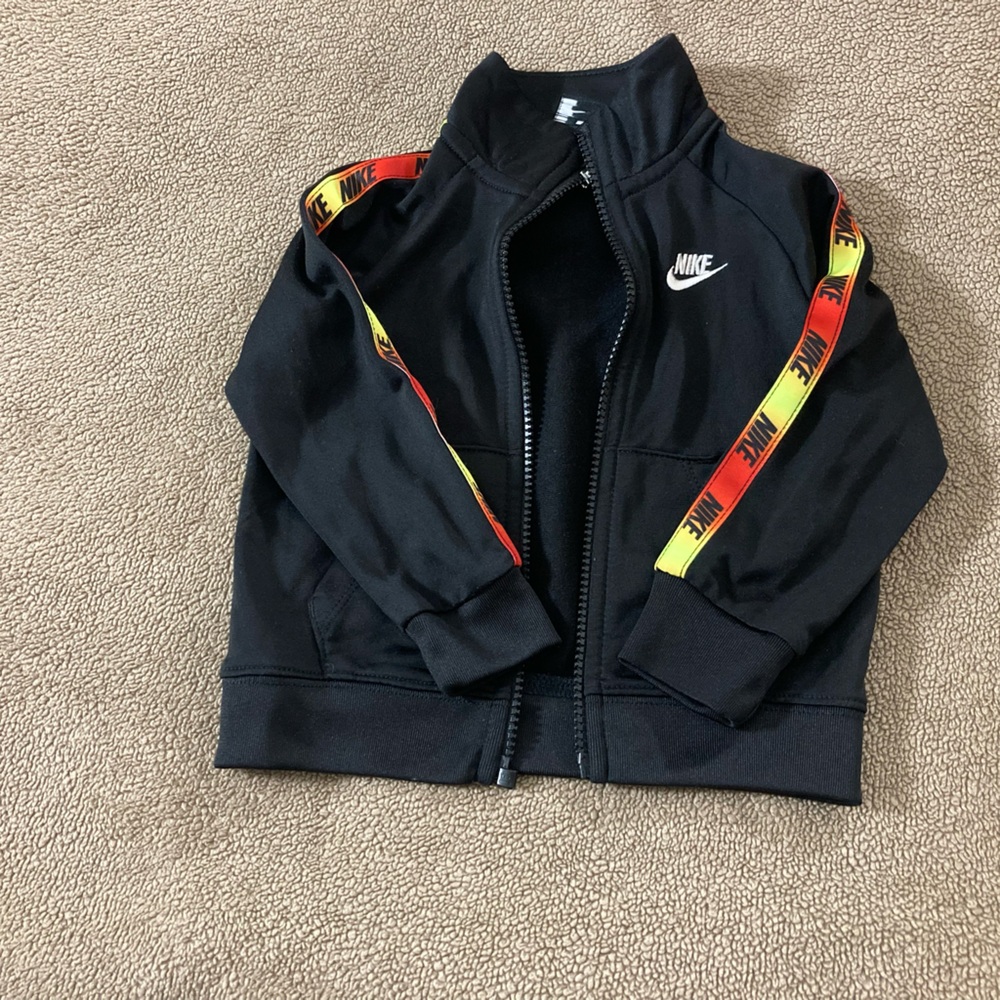 Nike Kids Black Jacket with Red-Yellow Stripe Detail